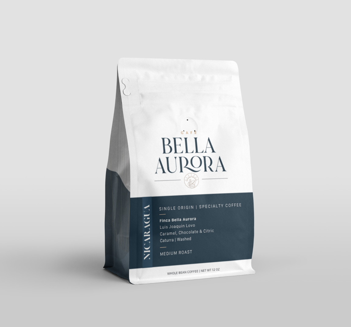 Café Bella Aurora coffee bag packaging, white bag with slate blue label, single origin specialty coffee from Nicaragua