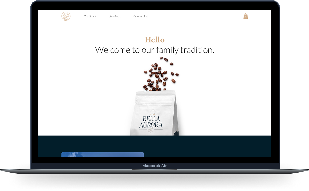 Café Bella Aurora e-commerce website on a Macbook Air