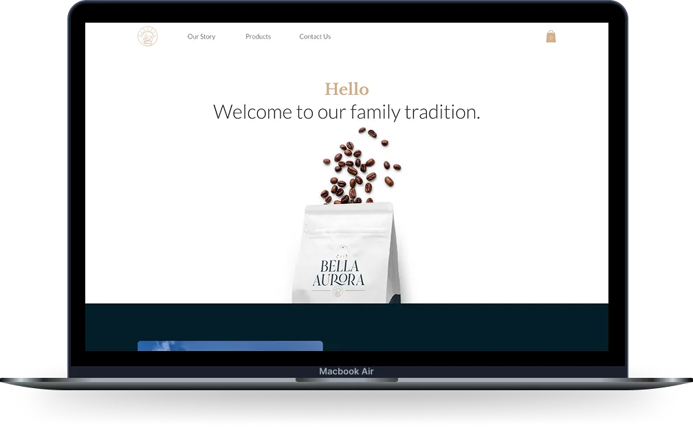 Café Bella Aurora e-commerce website on a Macbook Air